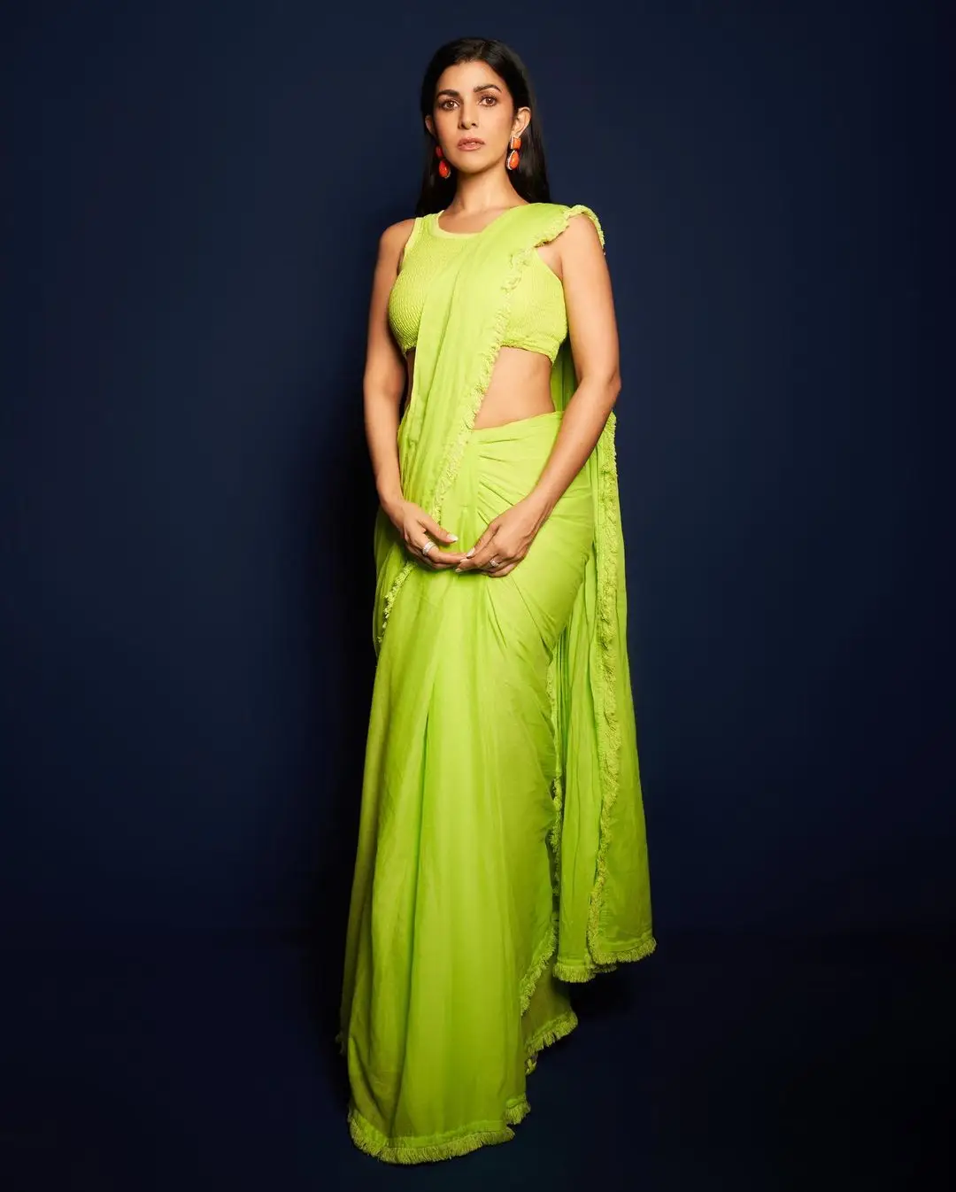 Bollywood Actress Nimrat Kaur Stills In Green Saree